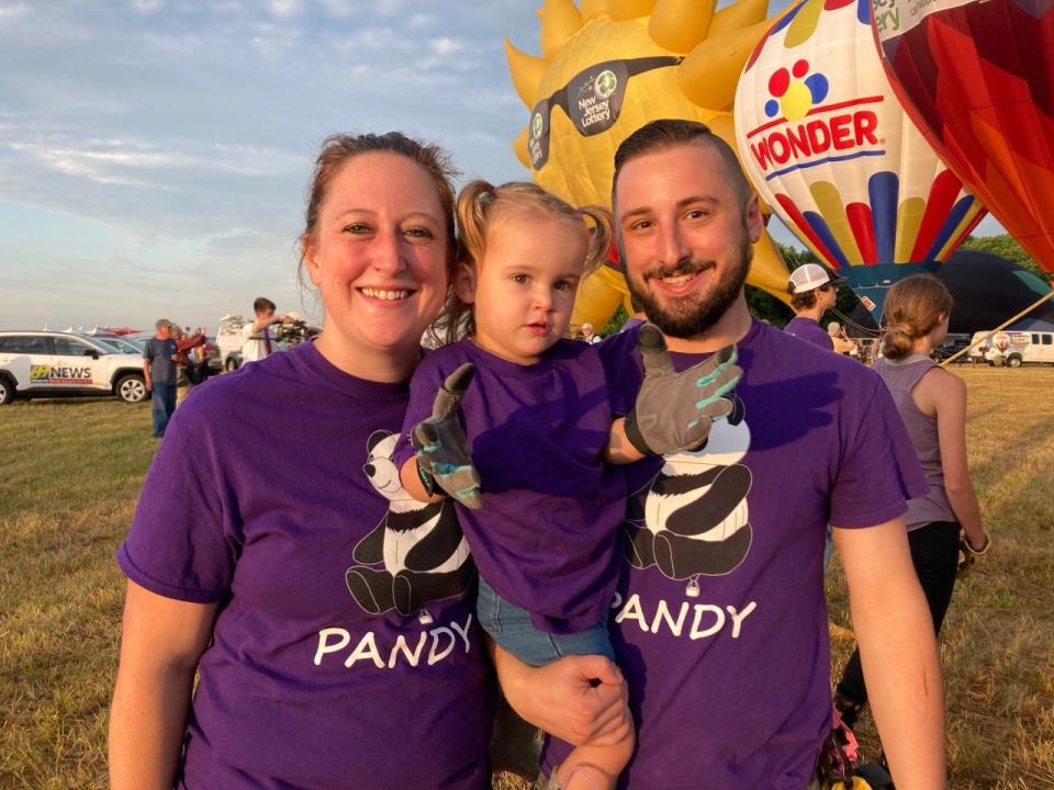 Meghan Marconi of Piscataway, her daughter, Liliana, 2 and husband David at the 39th annual New Jersey Lottery Festival of Ballooning at Solberg Airport in Readington.