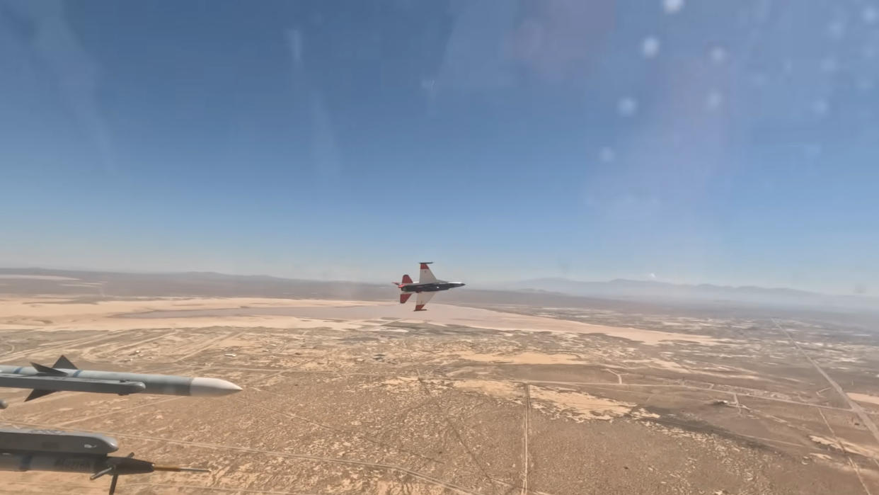  A screenshot from a video showing the The DARPA ACE Program AI-controlled F16 in dogfighting tests. 