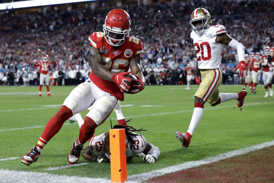 Kansas City Chiefs' Damien Williams (26) scores a touchdown against the San Francisco 49ers in Super Bowl LIV. (AP Photo/Mark Humphrey)