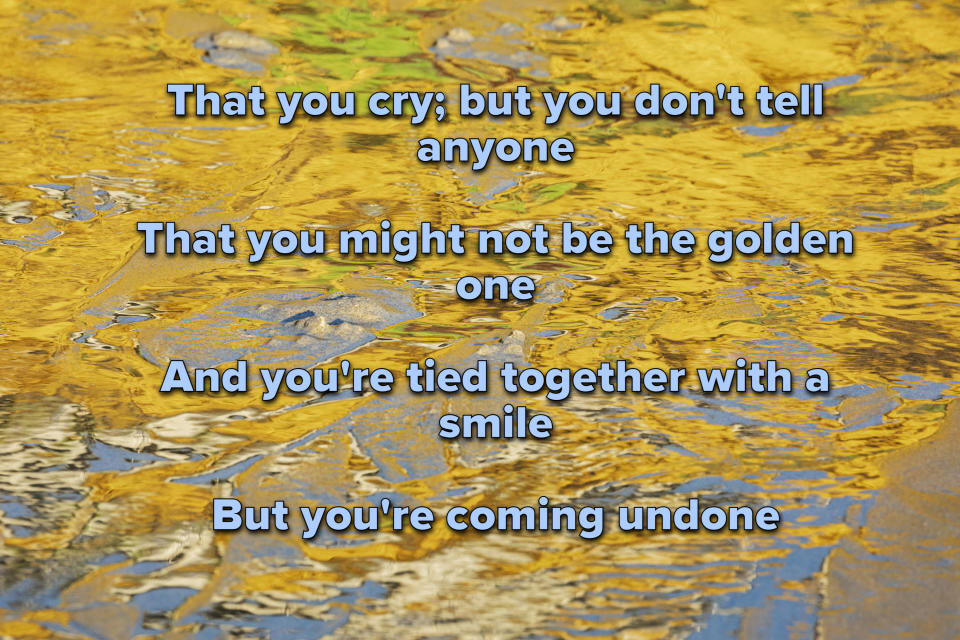 Gold background with lyrics from "Tied Together With a Smile" by Taylor Swift written in white text