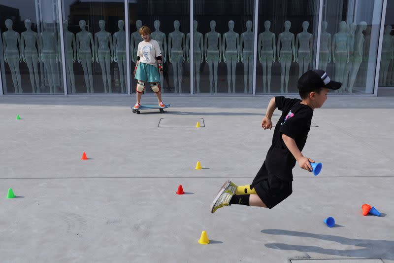 The Wider Image: Amid COVID shutdowns, Chinese women flock to skateboarding