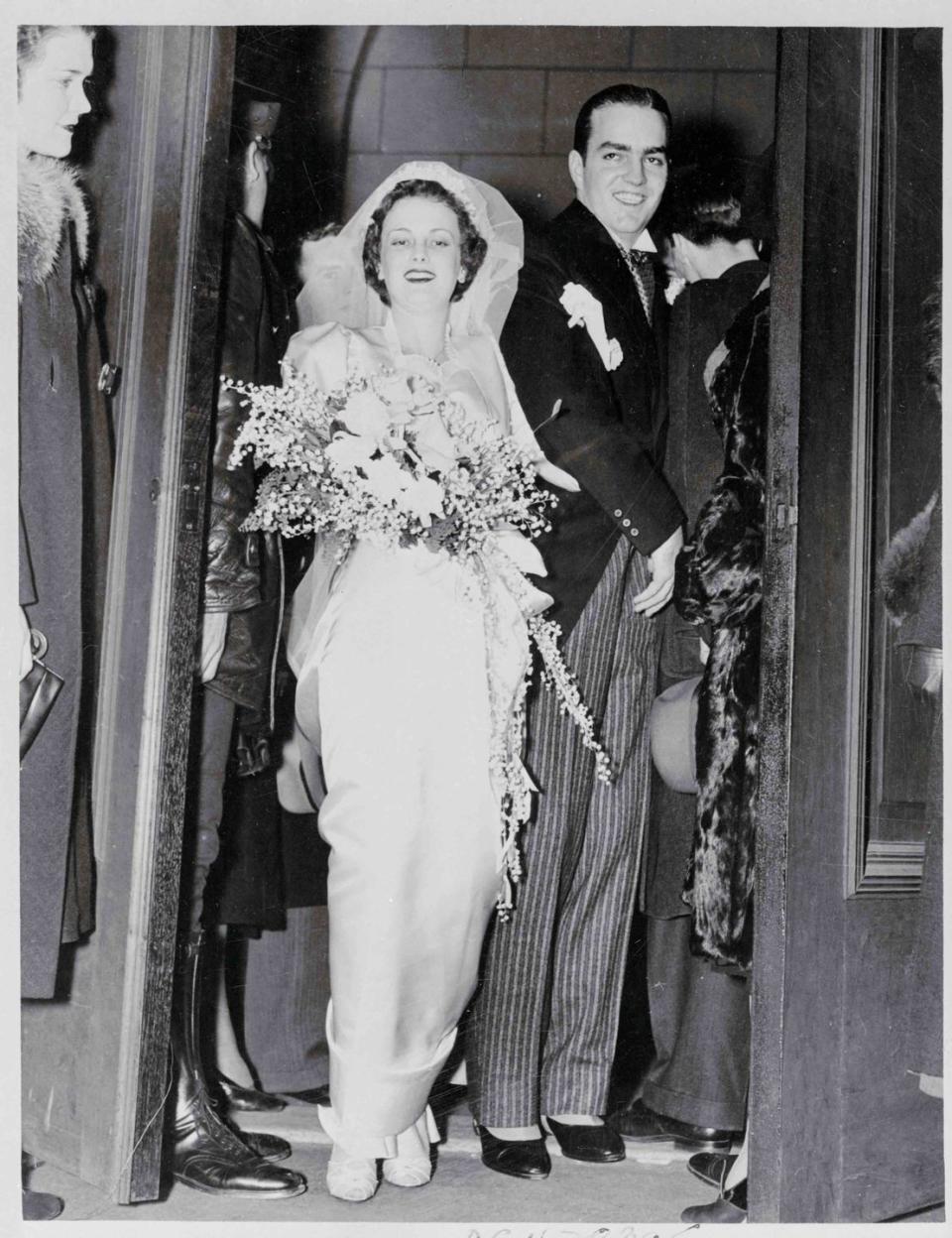 <p>In what was called Atlanta's wedding of the year, Catherine Wood Campbell married Randolph Apperson Hearst in 1938. Catherine was the only daughter of Morton Campbell, a wealthy telephone company executive while Randolph was the son of William Randolph Hearst, a media mogul (full disclosure: <em>Marie Claire</em> is a subsidiary of The Hearst Corporation). The wedding had nine bridesmaids and 15 groomsmen. The bride wore a <a href="https://people.com/archive/pattys-free-but-randolph-left-and-catherine-hearst-wonders-whats-next-vol-11-no-14/" rel="nofollow noopener" target="_blank" data-ylk="slk:white satin gown and tulle veil;elm:context_link;itc:0;sec:content-canvas" class="link ">white satin gown and tulle veil</a>. The couple went on to have five daughters: Catherine, Virginia, Patty, Anne, and Vicki. </p>