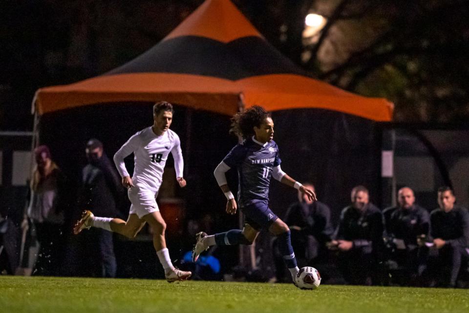 Bilal Kamal of the 16th-seeded University of New Hampshire dribbles past a defender against host No. 1 Oregon State in an NCAA men's soccer tournament round of 16 match Sunday, Nov. 28, 2021. OSU defeated UNH, 1-0, to advance to the quarterfinal round.