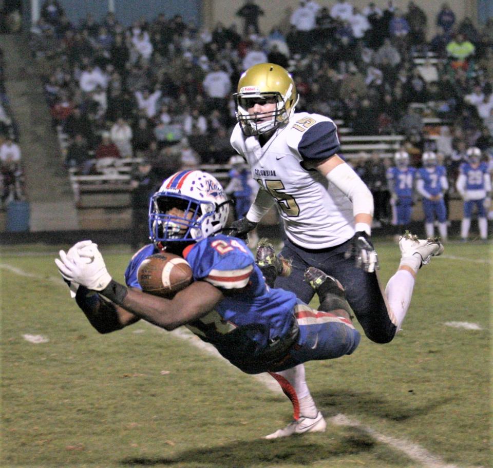 Sam Williams-Dixon makes a gallant diving attempt of a long pass, but came up empty when he hit the ground. Gunther Kissell of Columbian defended on the play.