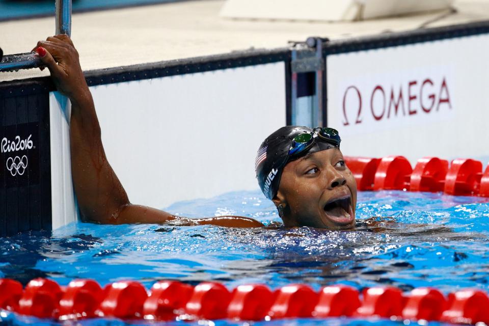 <p>Simone Manuel’s gold medal in the 100-meter freestyle became the first gold medal for an African-American female in an individual swimming event. (Getty) </p>
