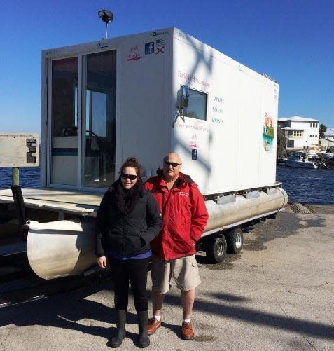 Bryn Adams and her late father, Rick Rawlins, traveled the St. Johns aboard their homemade house boat in 2015.