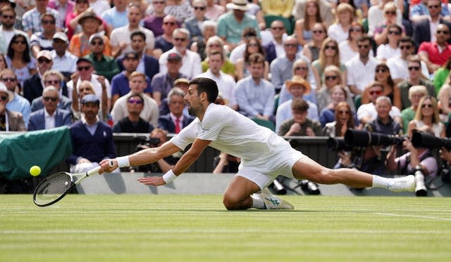 Novak Djokovic at full-stretch during his men's singles final against Carlos Alcaraz