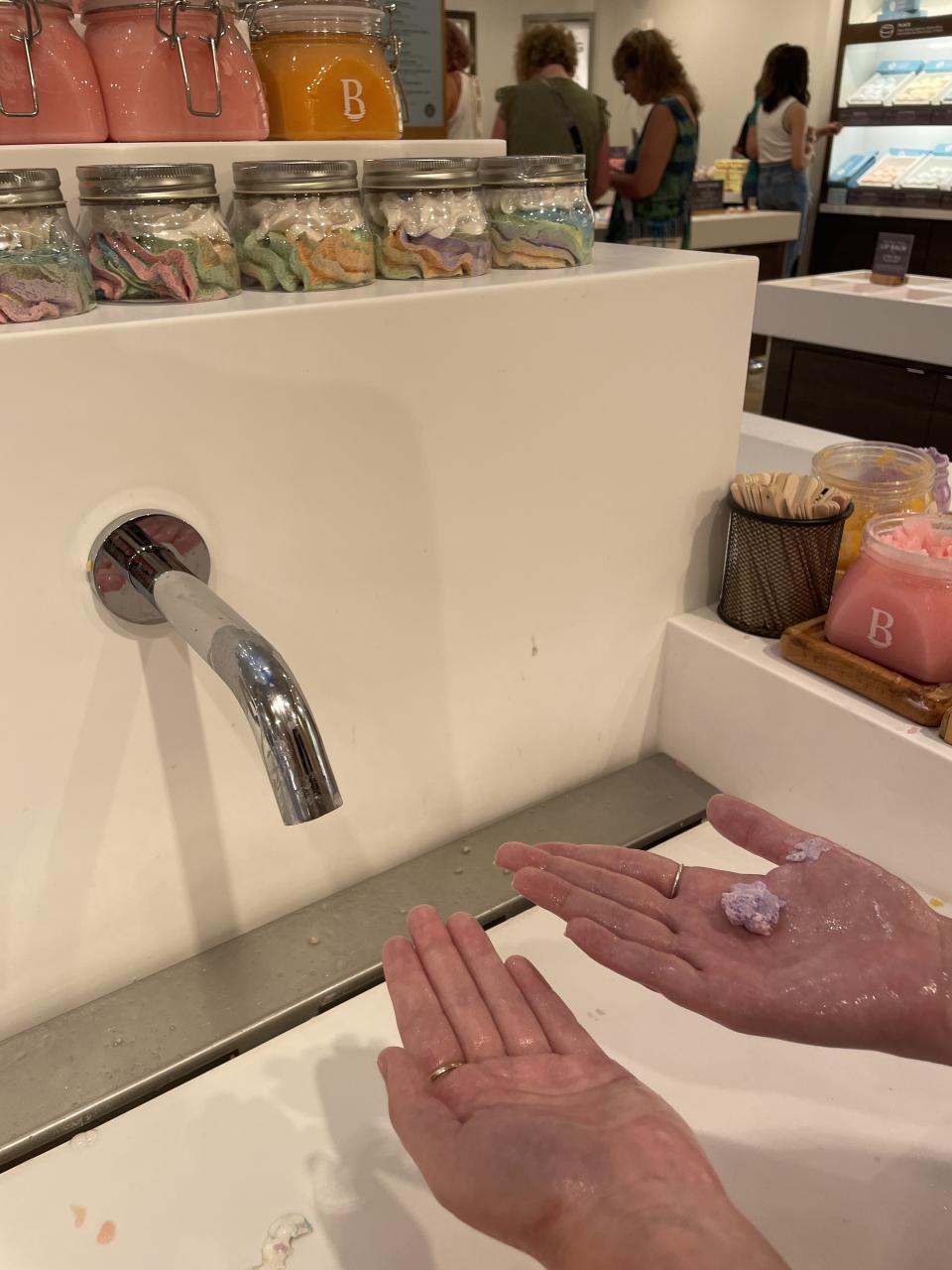 close up of hands being washed