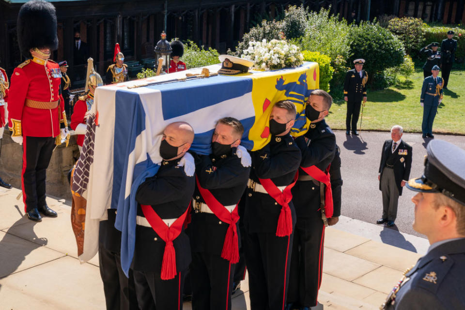 The coffin of Prince Philip is carried up the steps of St George's Chapel in Windsor by eight Pall Bearers