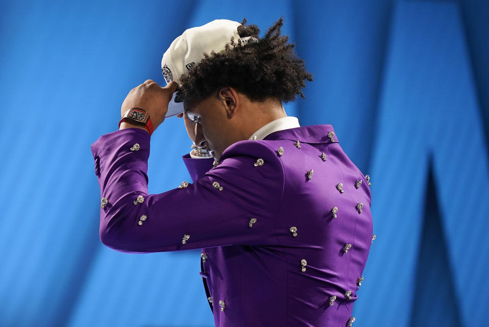 Paolo Banchero, dons a cap after being selected as the number one pick overall by the Orlando Magic in the NBA basketball draft, Thursday, June 23, 2022, in New York. (AP Photo/John Minchillo)