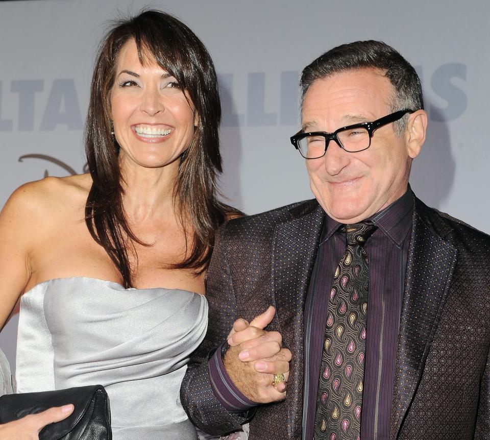 Robin Williams and his wife Susan Schneider at the premiere of 