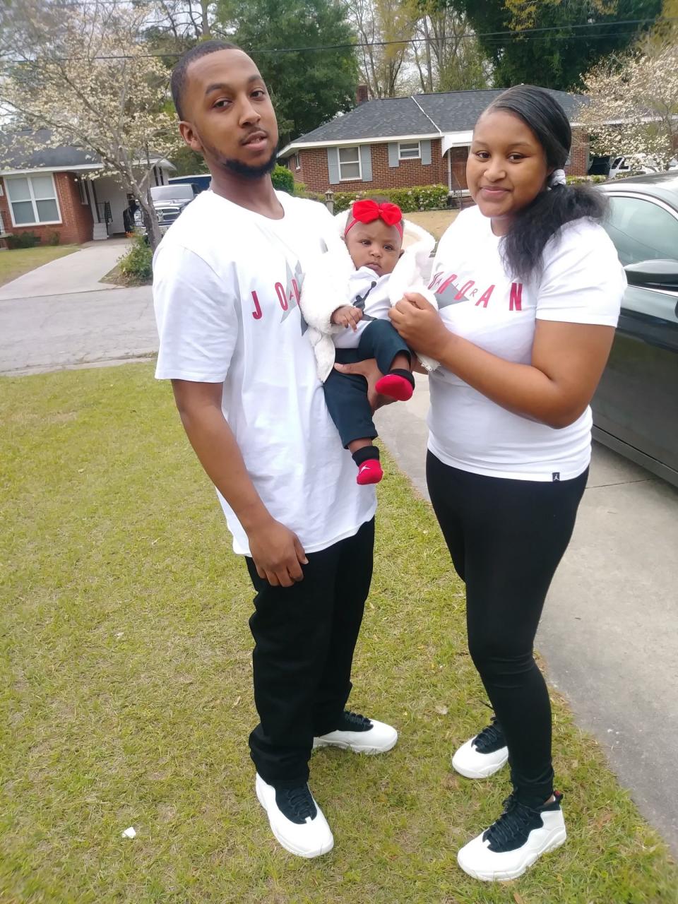 Jermaine Jones, left, with his daughter Alanah Jones, and his fiancé, Letayia Anderson.