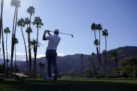 Tom Hoge follows his shot on the 18th tee during the third round of the American Express golf tournament at La Quinta Country Club, Saturday, Jan. 22, 2022, in La Quinta, Calif. (AP Photo/Marcio Jose Sanchez)