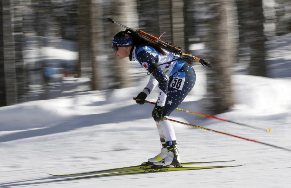 FILE - United States' Joanne Reid competes during the women's 7,5 km sprint competition at the World Championships Biathlon event in Pokljuka, Slovenia on Feb. 13, 2021. The United States Biathlon national champion was sexually harassed and abused for years by a ski-wax technician while racing on the sport's elite World Cup circuit, investigators found. When the two-time Olympian complained, Reid said she was told his behavior was just part of the male European culture. (AP Photo/Darko Bandic, File)