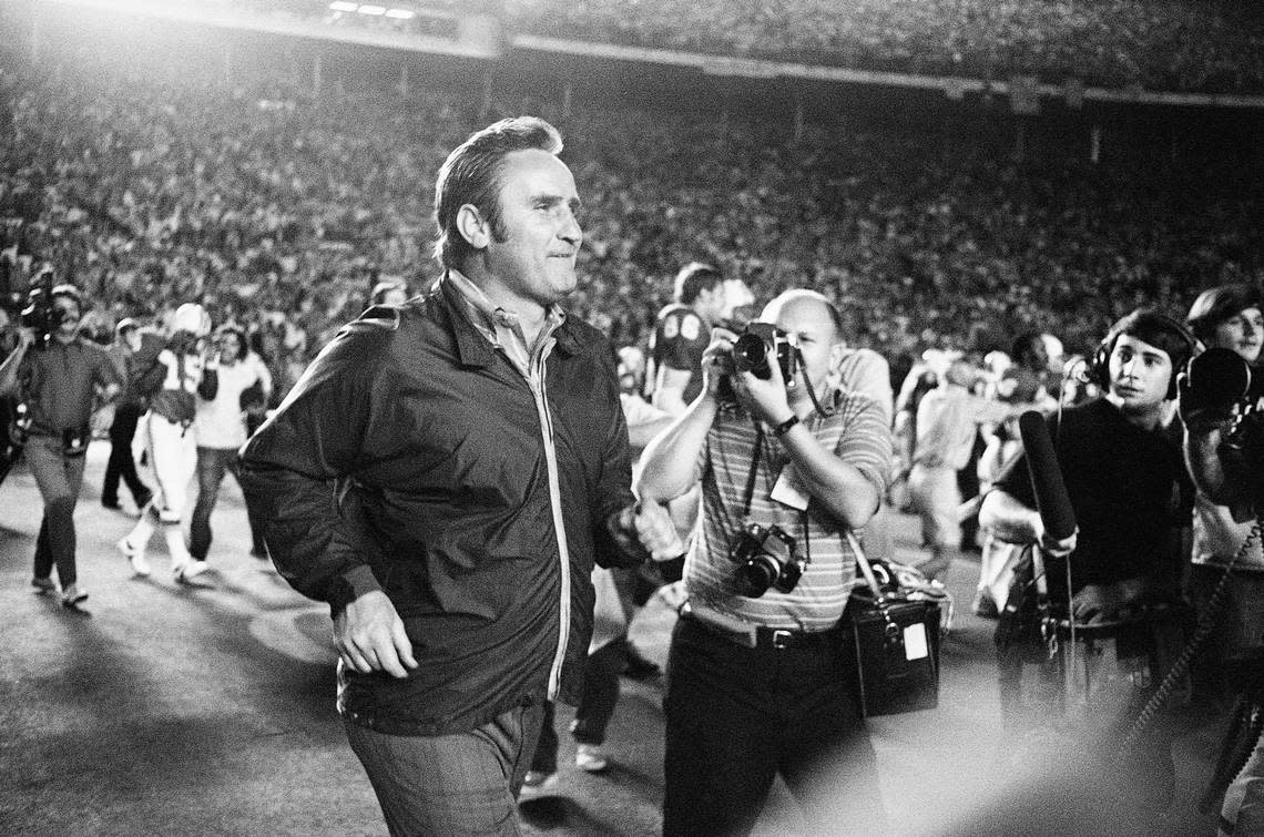 Miami Dolphins coach Don Shula sprints across the Orange Bowl turf on Jan. 2, 1972 in Miami, Fla., after his team shutout the Baltimore Colts 21-0 to win the American Football Conference championship and win a berth in the Super Bowl. (AP Photo)