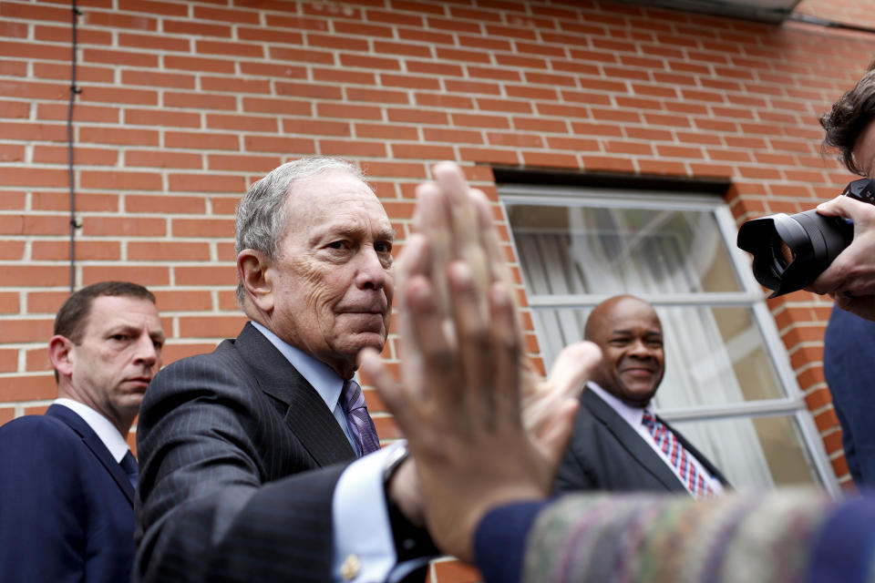 Democratic presidential candidate, former New York City mayor Mike Bloomberg high-fives a  boy as he arrives at Brown Chapel AME for a worship service in Selma, Alabama on March 1, 2020. - A resounding victory in South Carolina has thrust Joe Biden back into the race for the Democratic presidential nomination, but that could all change in two days when voters go to the polls in 14 "Super Tuesday" states. Buttigieg, Warren, Klobuchar and billionaire Michael Bloomberg have all made it clear that they will stick around at least through Super Tuesday. (Photo by Joshua Lott / AFP) (Photo by JOSHUA LOTT/AFP via Getty Images)