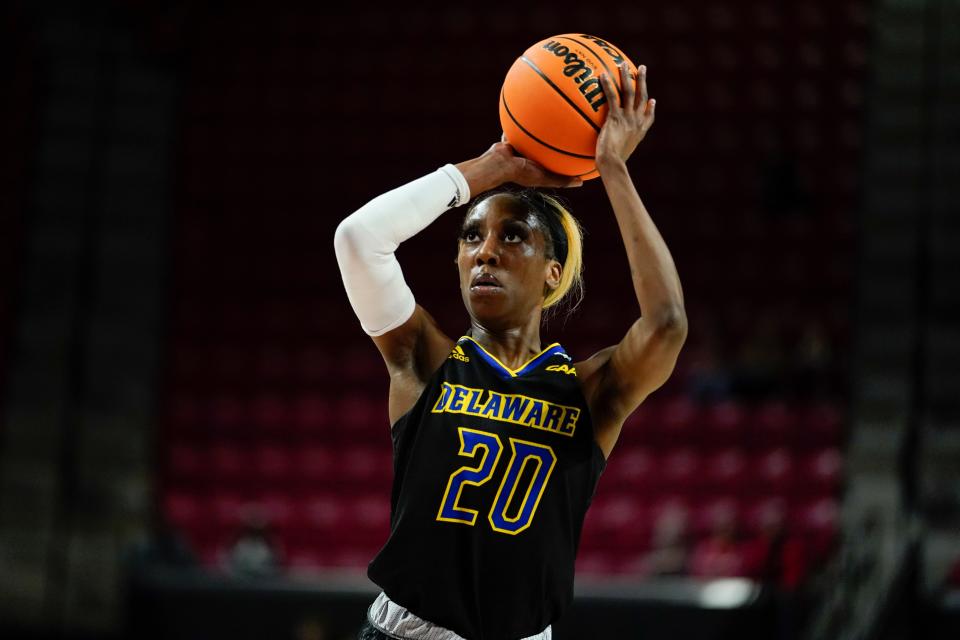 Delaware guard Jasmine Dickey shoots against Maryland during the first half of a college basketball game in the first round of the NCAA tournament, Friday, March 18, 2022, in College Park, Md. (AP Photo/Julio Cortez)