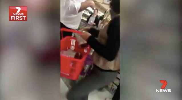 Dozens of videos have emerged online of Chinese shoppers bulk buying baby formula. Source: 7 News