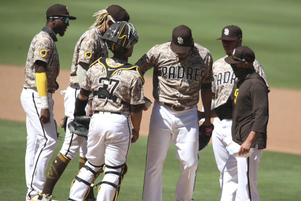 San Diego Padres Dinelson Lamet is taken out of the game against the Arizona Diamondbacks' in the seventh inning of a baseball game Sunday, Aug. 9, 2020, in San Diego. (AP Photo/Derrick Tuskan)