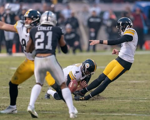 Pittsburgh Steelers kicker Chris Boswell (9) slips during a field goal attempt to tie the game against the Oakland Raiders during the fourth quarter at Oakland Coliseum - Credit: Neville E. Guard/USA TODAY