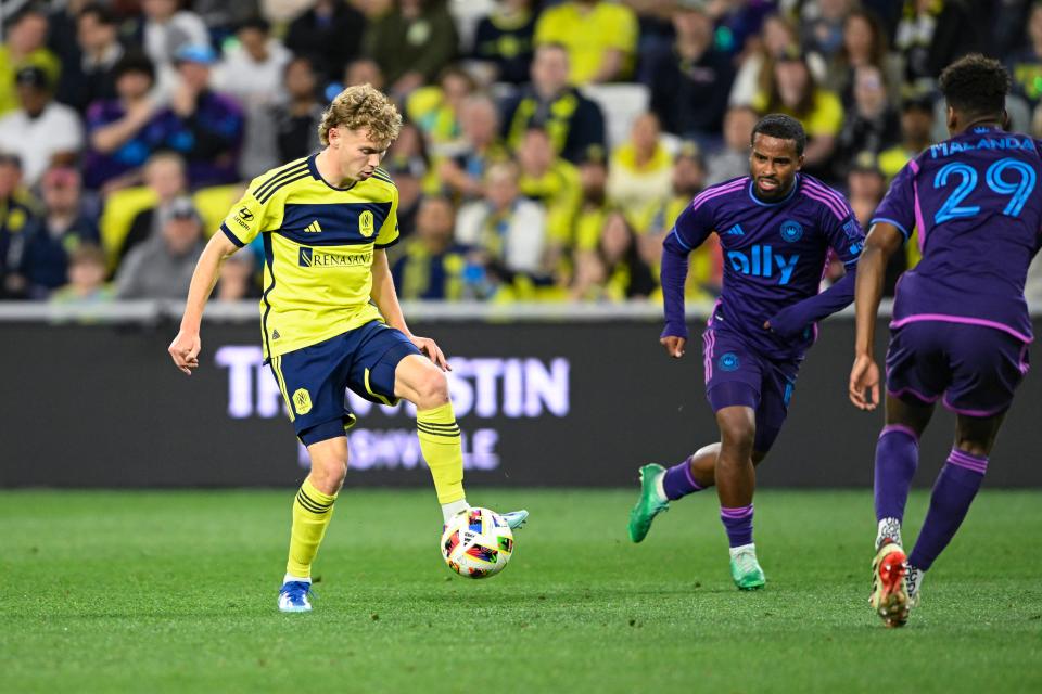 Mar 16, 2024; Nashville, Tennessee, USA; Nashville SC forward Jacob Shaffelburg (14) receives a pass during the second half against Charlotte FC at Geodis Park. Mandatory Credit: Steve Roberts-USA TODAY Sports