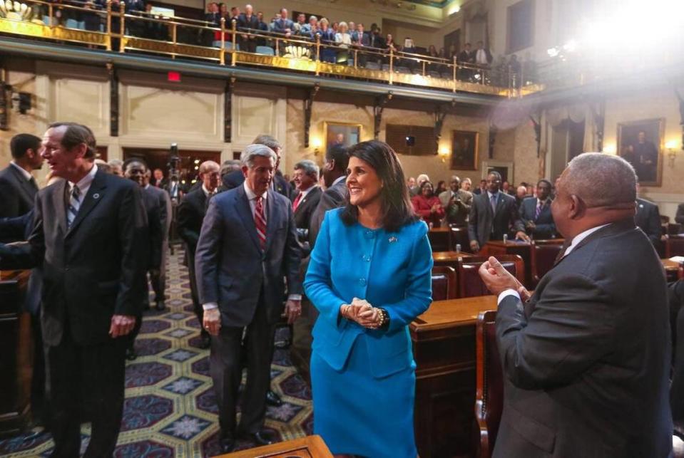 Gov. Nikki Haley greets the legislators as she enters the chambers of the South Carolina House of Representatives Wednesday night to give her State of the State address. 1/21/15