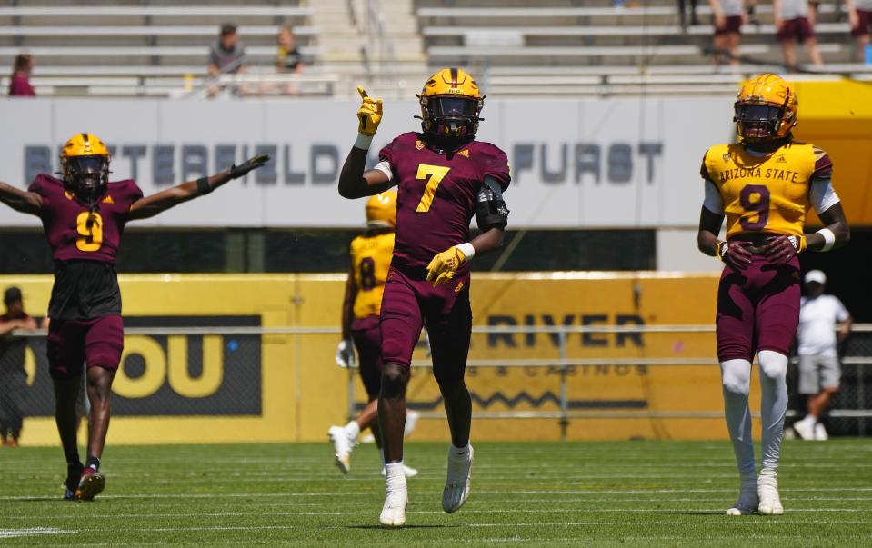 ASU defensive back Shamari Simmons (7) celebrates a pass break up against wideout Troy Omeire (9) during the Spring Game at Sun Devil Stadium in Tempe on April 15, 2023.