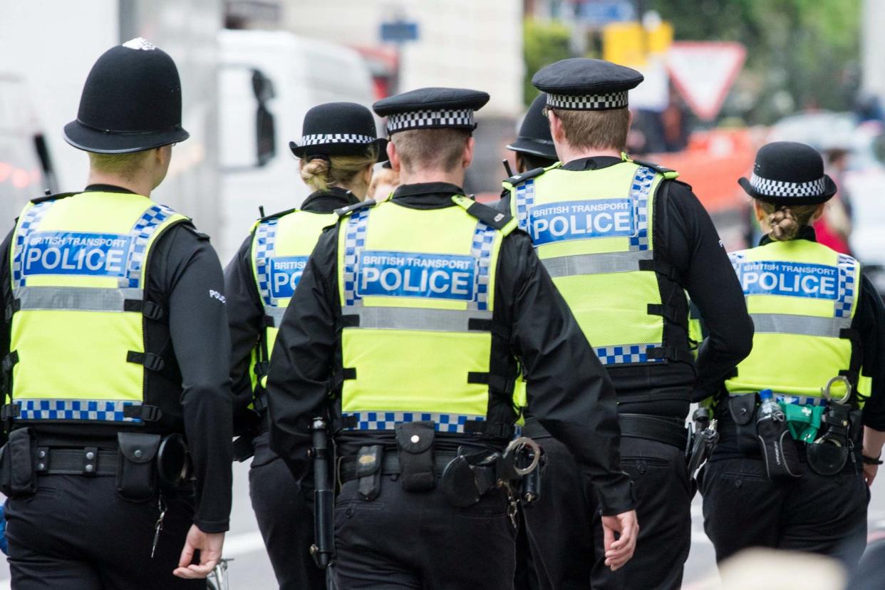 British Transport Police officers. BTP have said cyber-flashing goes largely unreported: PA