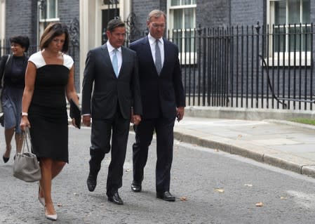 Richard Gnodde of Goldman Sachs and Jes Staley of Barclays leave Downing Street in London