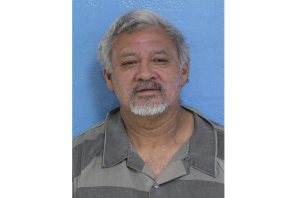 This booking photo provided the Kingsport, Tenn., Police Department shows Saul A. Carrera. Carrera, the driver of a tractor-trailer that hit a van alongside an interstate in East Tennessee on Sunday, March 26, 2023, killing four people who were changing a tire and critically injuring another, was impaired, police said. (Kingsport Police Department via AP)