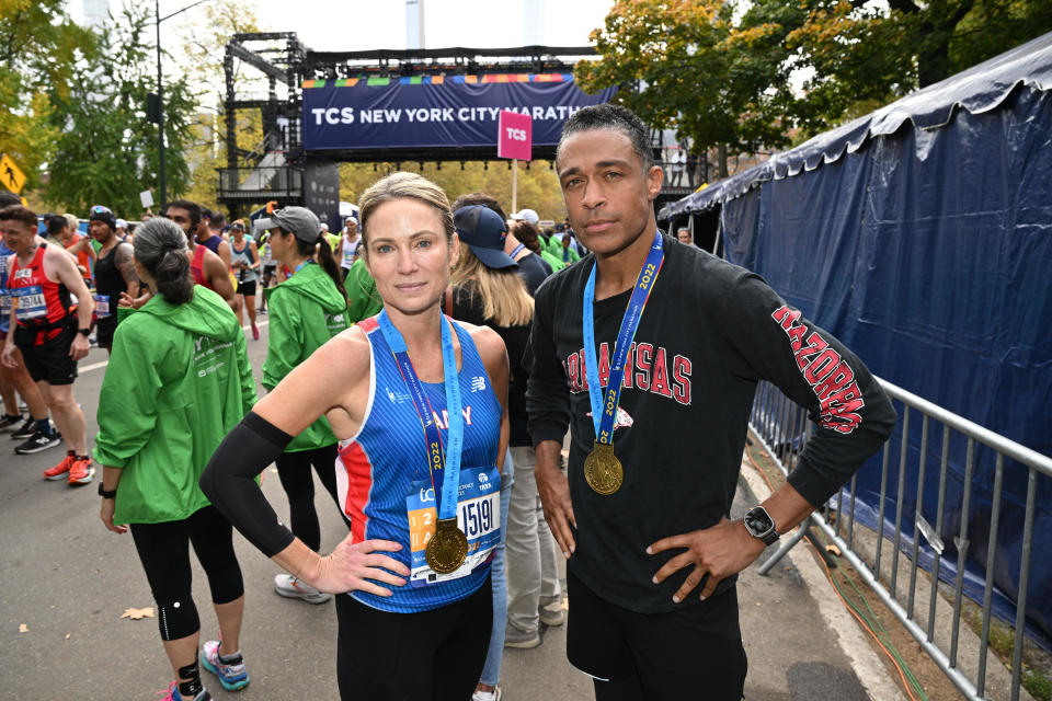 Amy Robach and T.J. Holmes at the finish line of the the 2022 TCS New York City Marathon on Nov. 6, 2022. / Credit: Bryan Bedder/New York Road Runners via Getty Images