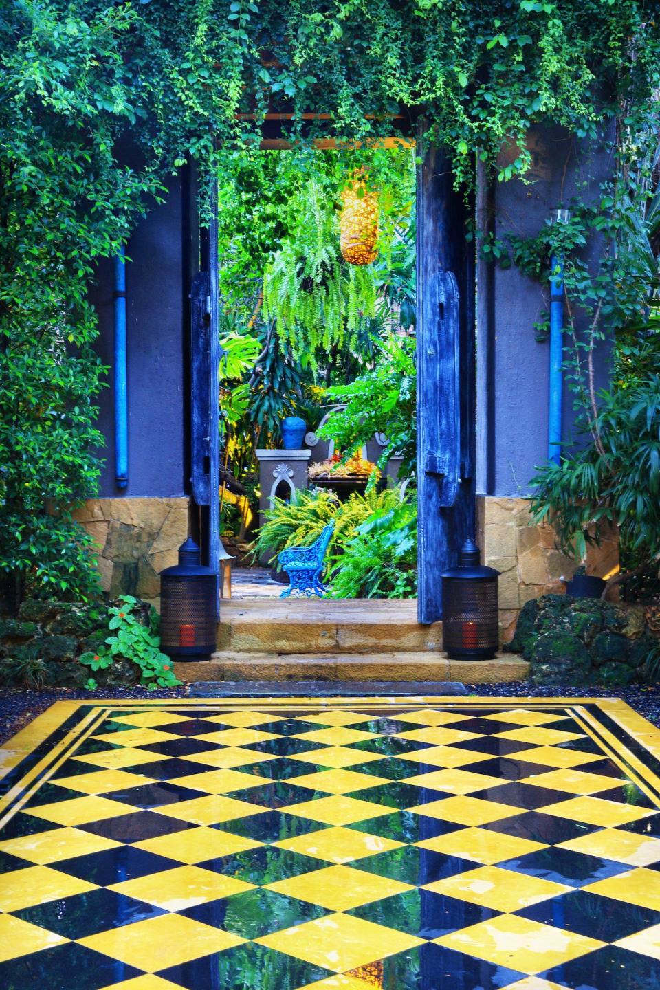 A whimsical entrance to Bensley’s Bangkok bungalow.