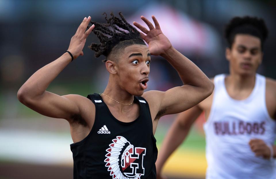 Domonic Brown Jr. crosses the finish line in the finals of the 110 Meter Hurdles during the Evansville Central IHSAA Boys Regional Track & Field Meet at Central Stadium Thursday evening, May 26, 2022. Brown came in third place with a time of 15.68 and advanced to state.