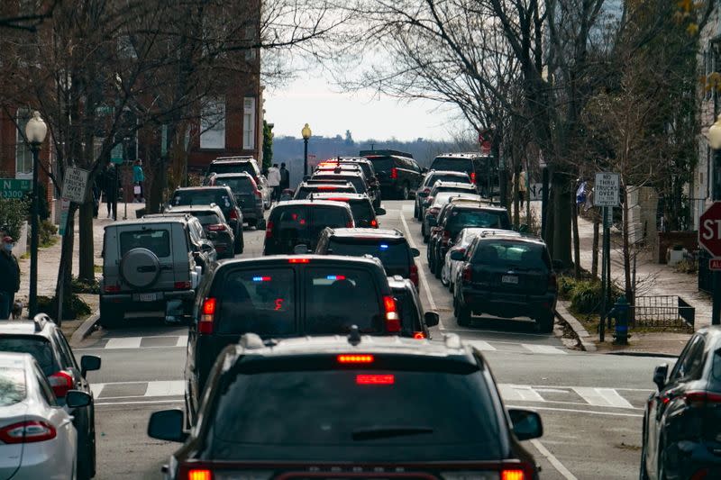 U.S. President Joe Biden's motorcade travels through the Georgetown neighborhood of Washington, DC after a visit to Holy Trinity Catholic Church in Washington