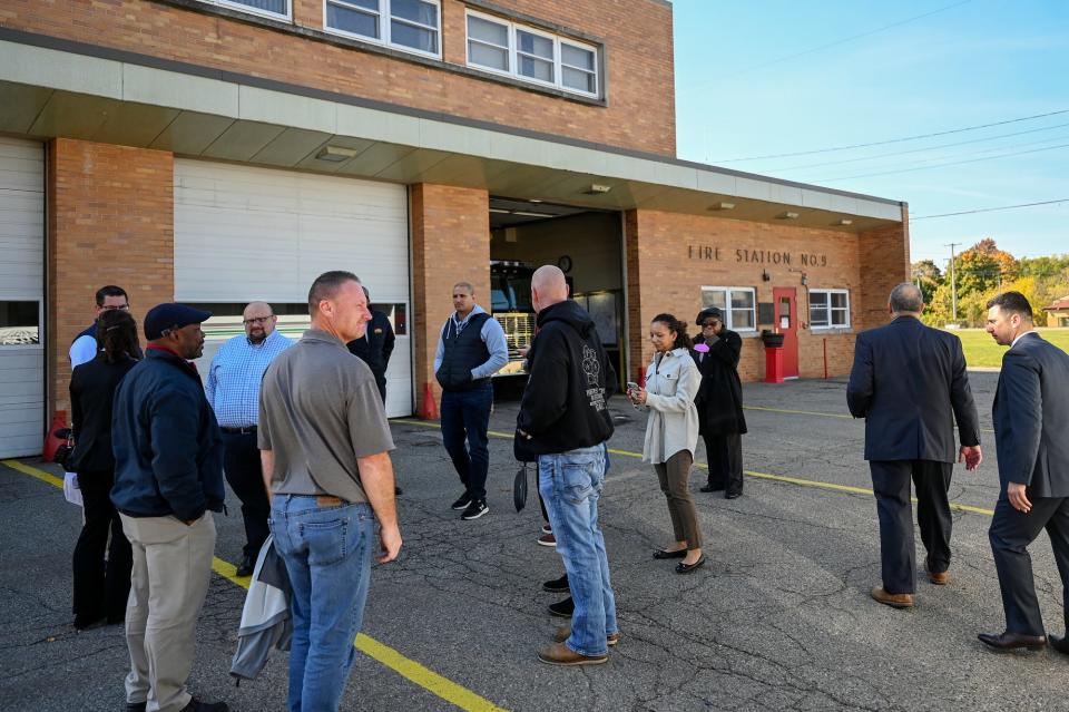 A group arrives at Lansing Fire Station 9 for a tour of the facility in need of upgrades during a tour on Friday, Oct. 21, 2022, in Lansing.