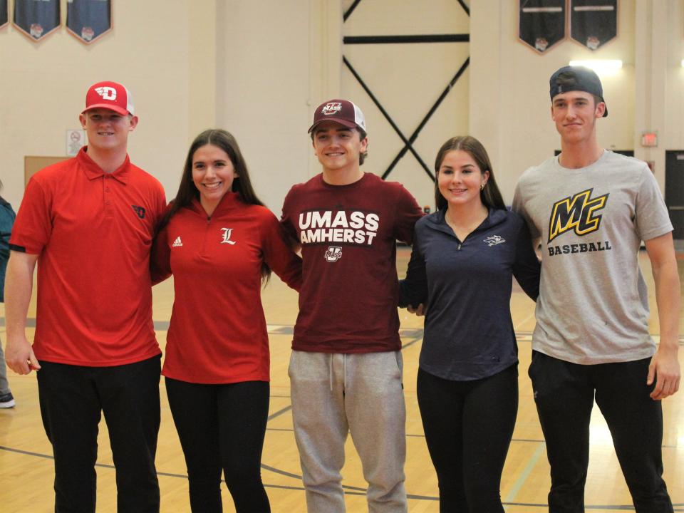 From left to right: Taunton's Ryan MacDougall, Ava Venturelli, Braden Sullivan, Kaysie DeMoura and Dawson Bryce pose after signing their National Letters of Intent during a ceremony on Nov. 14, 2022.