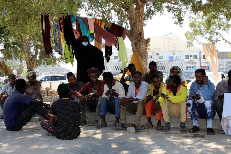 Ethiopian migrants gather to protest their treatment in the war-torn country during a sit-in outside a compound of United Nations organizations in the southern port city of Aden