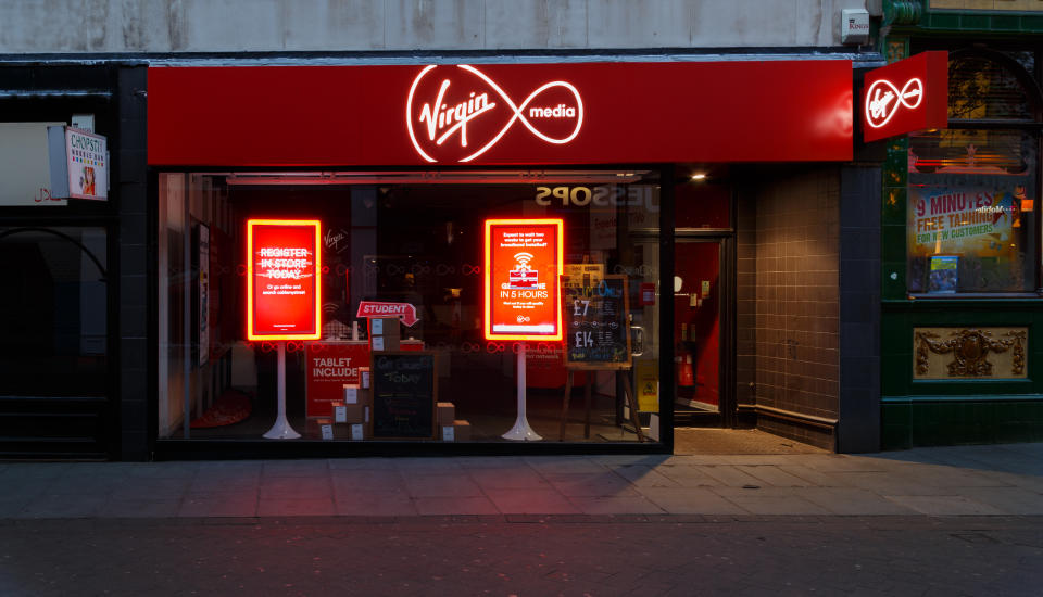 Nottingham, England - August 30, 2016: Frontage of the Virgin Media store at night on Clumber Street. In Nottingham, England. On 30th August 2016.