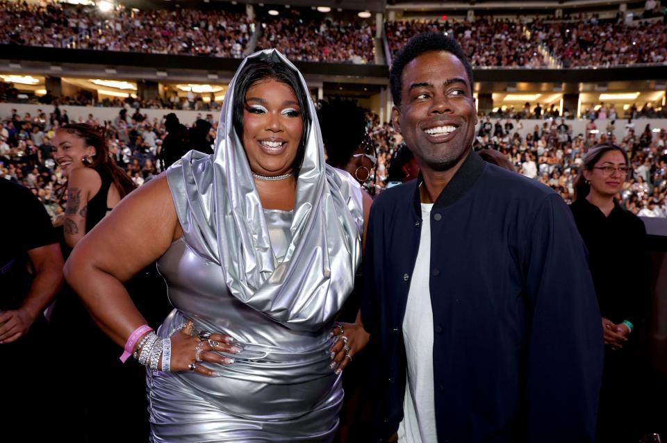 Lizzo and Chris Rock attend the 