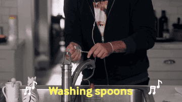 Man singing "Washing spoons, washing the dishes!"