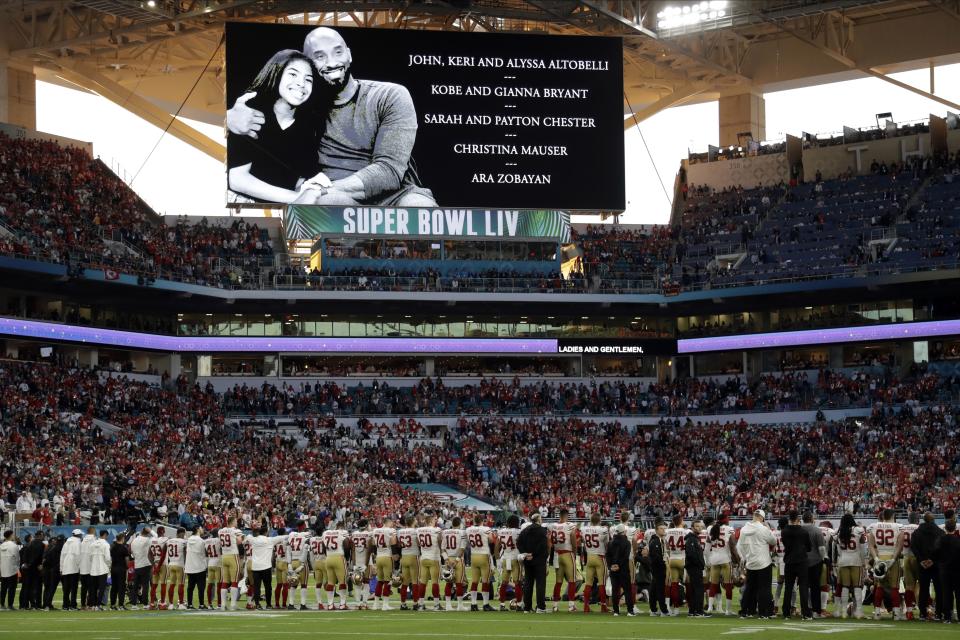 Kobe Bryant and his daughter Gianna Bryant are honored along with all of the helicopter crash victims before the NFL Super Bowl 54 football game between the San Francisco 49ers and Kansas City Chiefs Sunday, Feb. 2, 2020, in Miami Gardens, Fla. (AP Photo/Chris O'Meara)