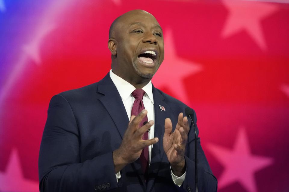 Republican presidential candidate Sen. Tim Scott, R-S.C., speaks during a Republican presidential primary debate hosted by NBC News, Wednesday, Nov. 8, 2023, at the Adrienne Arsht Center for the Performing Arts of Miami-Dade County in Miami. | Rebecca Blackwell, Associated Press