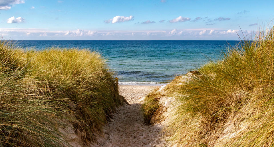 Holiday fun is eroding sand dunes in Europe.  Source: Getty