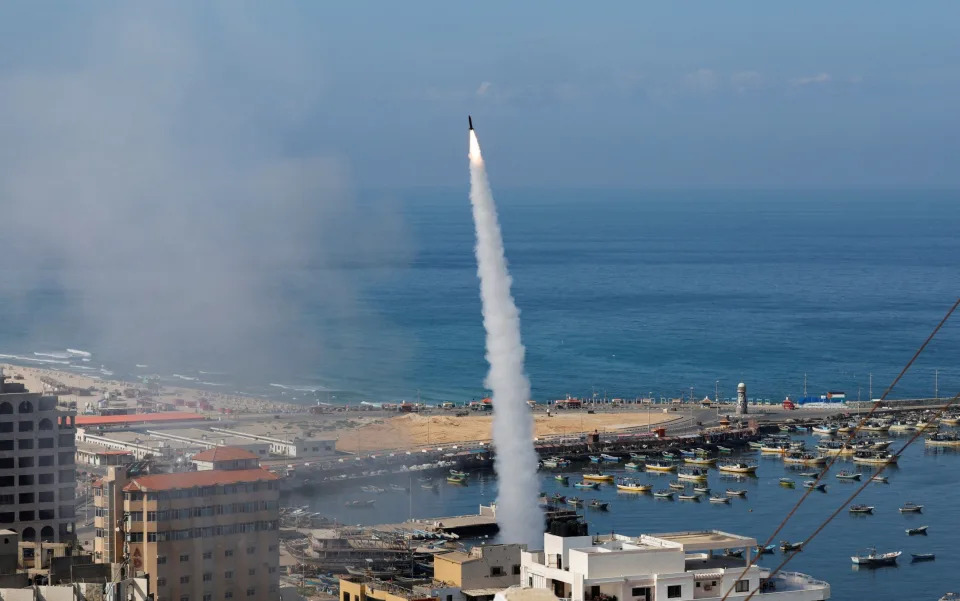 Rockets are fired by Palestinian militants into Israel, in Gaza City