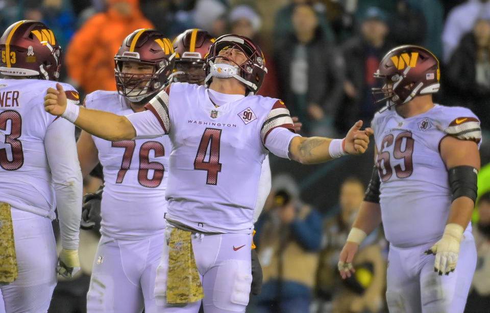 PHILADELPHIA, PA - NOVEMBER 14: Washington Commanders quarterback Taylor Heinicke (4) celebrates a late penalty giving the Washington Commanders a first down /late during the fourth quarter of the game at Lincoln Financial Field  on November 14, 2022. (Photo by John McDonnell/The Washington Post via Getty Images)