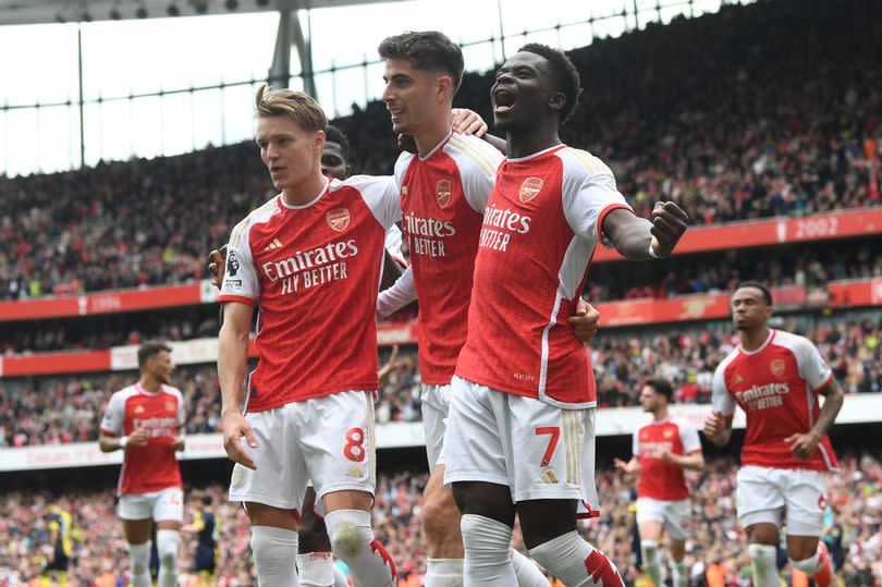 Arsenal players celebrate against Bournemouth