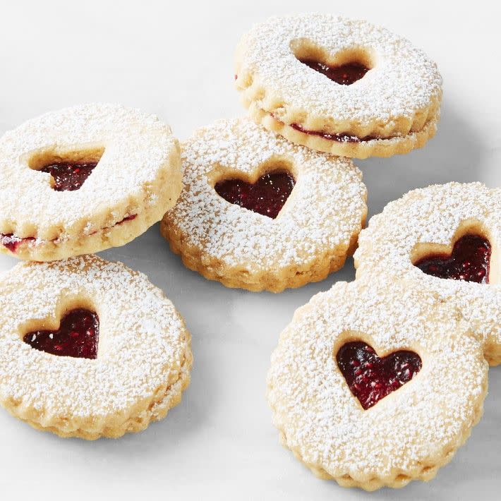 <p><a href="https://go.redirectingat.com?id=74968X1596630&url=https%3A%2F%2Fwww.williams-sonoma.com%2Fproducts%2Fheart-linzer-cookies&sref=https%3A%2F%2Fwww.womansday.com%2Frelationships%2Fdating-marriage%2Fg1414%2Fvalentines-day-gifts-women%2F" rel="nofollow noopener" target="_blank" data-ylk="slk:Shop Now;elm:context_link;itc:0;sec:content-canvas" class="link rapid-noclick-resp">Shop Now</a></p><p>Heart Linzer Cookies</p><p>williams-sonoma.com</p><p>$49.95</p><span class="copyright">Williams-Sonoma</span>