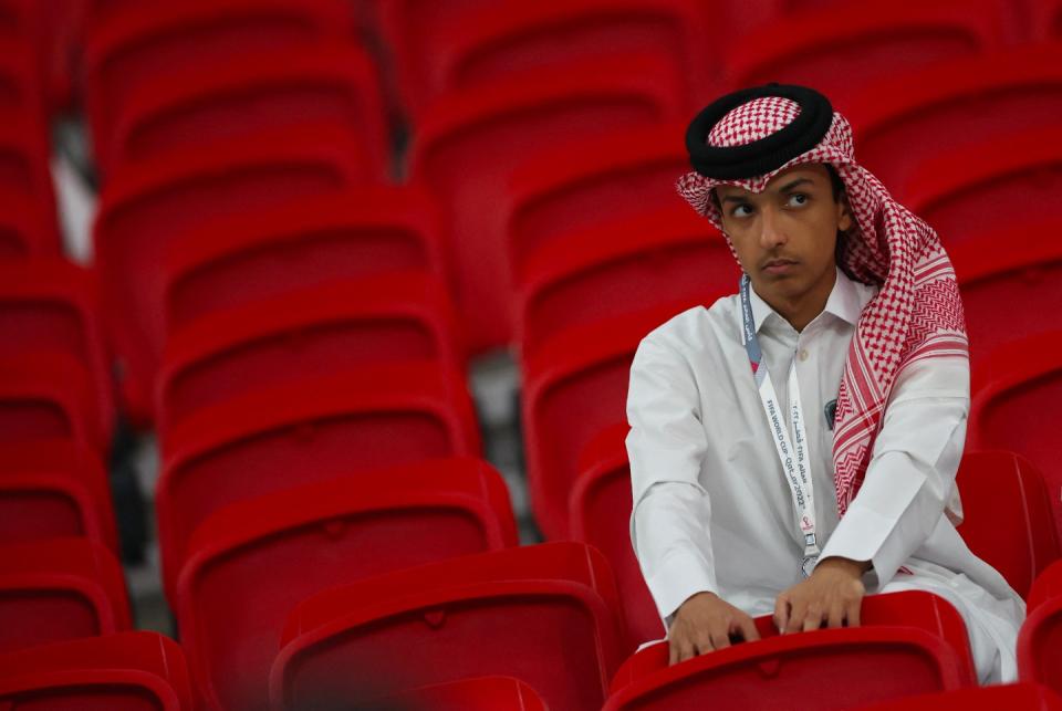 Soccer Football - FIFA World Cup Qatar 2022 - Group A - Qatar v Senegal - Al Thumama Stadium, Doha, Qatar - November 25, 2022 A Qatar fan looks dejected in a stand after the match REUTERS/Amr Abdallah Dalsh