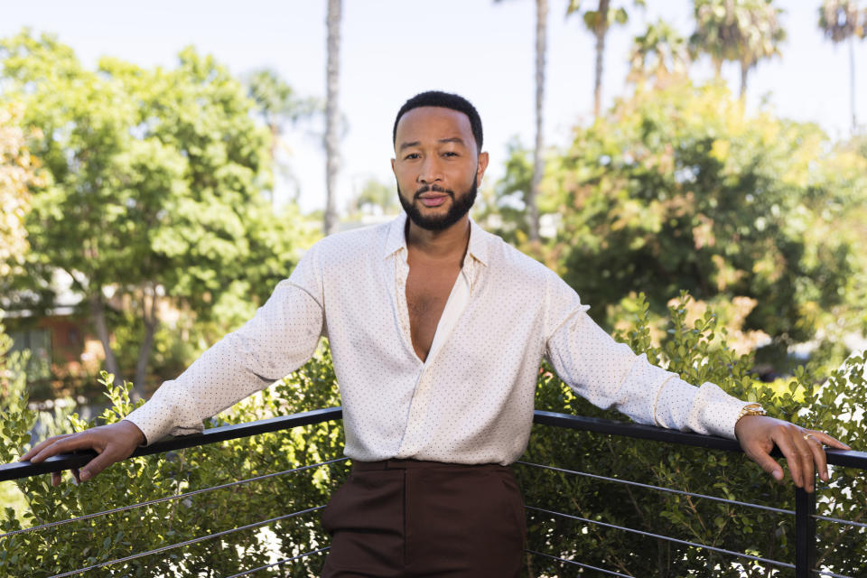 John Legend poses for a portrait on Monday, Aug. 15, 2022, in West Hollywood, Calif., to promote his latest double album "Legend." (Photo by Willy Sanjuan/Invision/AP)