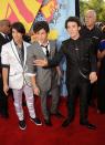 <p>The Jonas brothers were definitely coordinating in these white, gray, and black suits at the 2008 VMAs.</p>